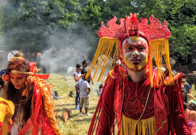 Vibrant scene during a cultural event managed by Sonia Kozlova Clark.